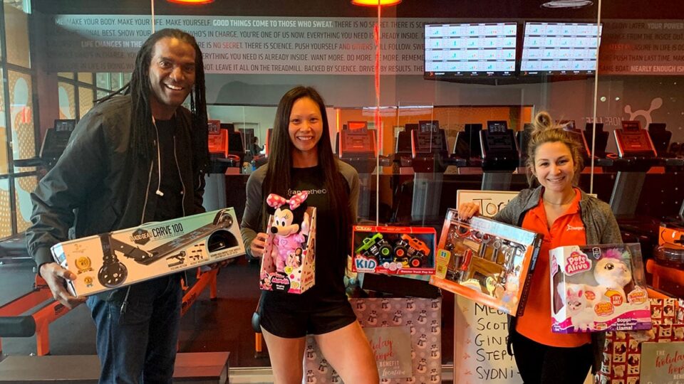 Henry Sneed with Orange Theory Team - Toy Drive