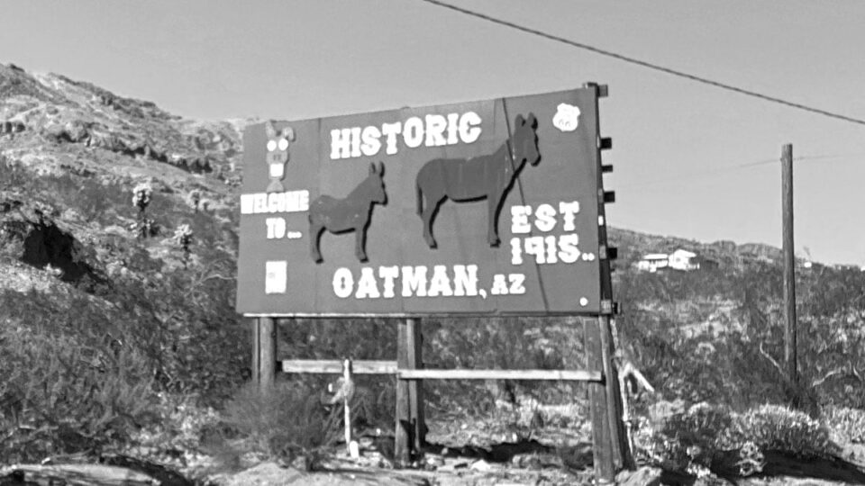 Welcome to Oatman Sign in Black and White - Suitable for the location
