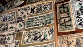 Signed dollar bills all over the walls of mountain springs saloon