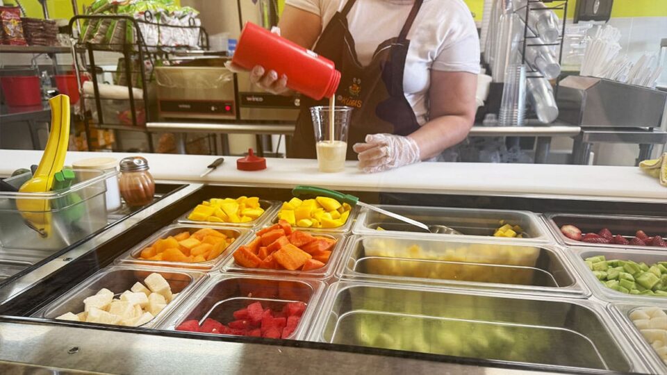 Fresas con crema being prepared at Lokuras Mexican Raspados