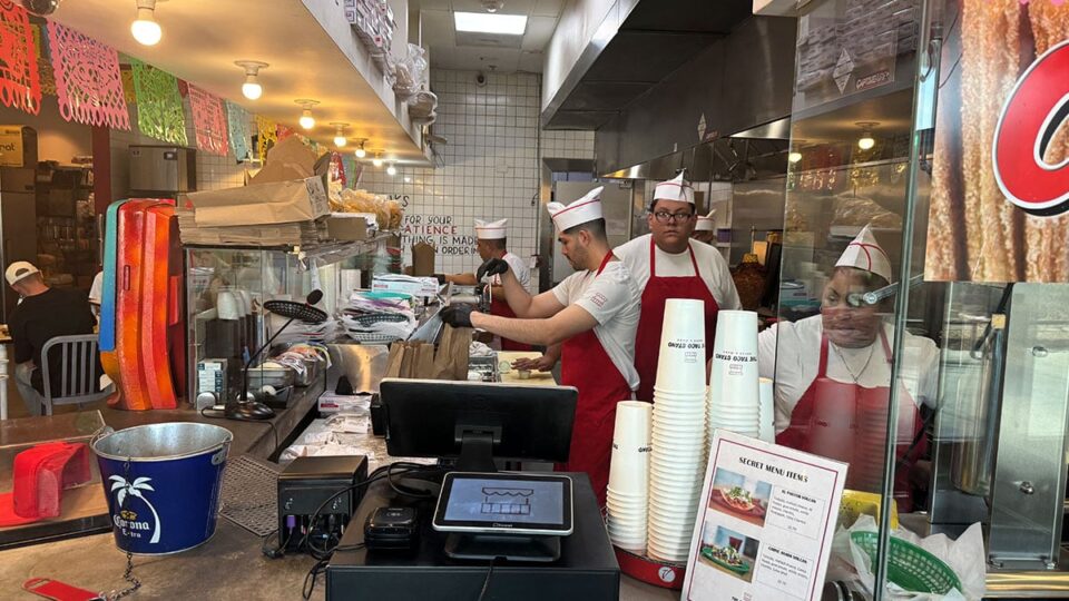 The taco team behind the counter