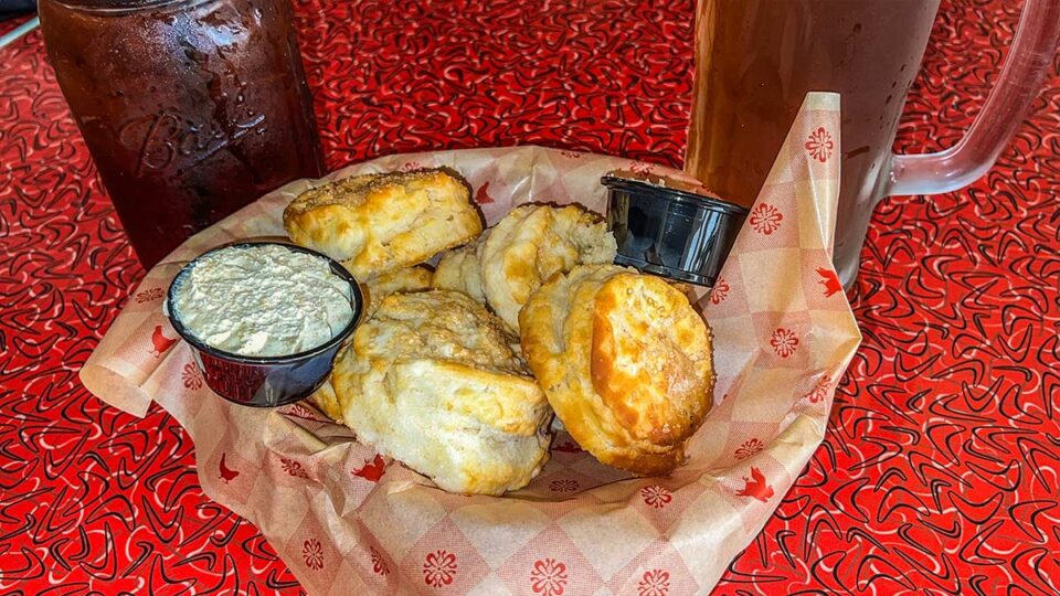 Sweet tea, ice-cold beer, and house-made biscuits with apple butter and honey butter—Lucille’s starters don’t play.