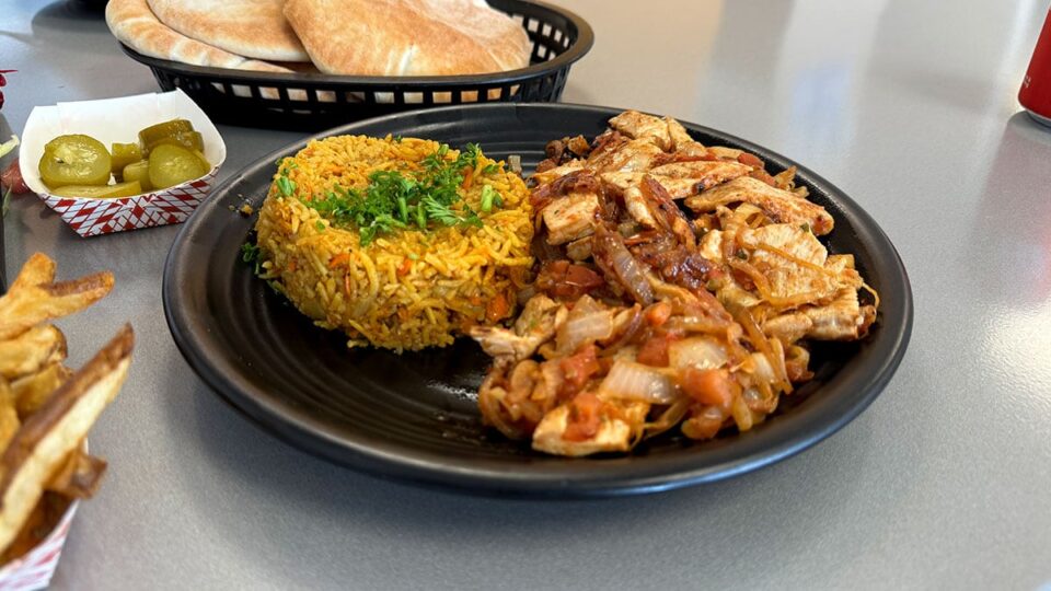 Grilled Chicken Breast with onion, tomatos and a side of rice