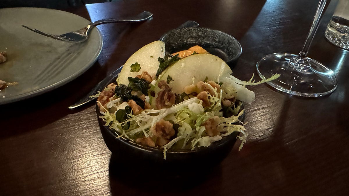 Ensalada De Pera - frisée, fried lollipop kale, miticaña goat cheese, walnuts, lemon vinaigrette, fragrant pear