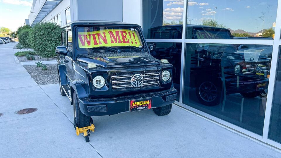 Golf cart displayed outside Carmine's Pizza Kitchen with a large WIN ME sign during a September 2025 promotion
