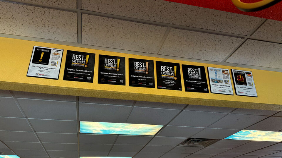 Best of Las Vegas Awards on the wall greeting customers