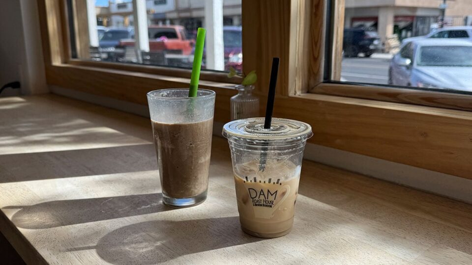 Iced latte and chai on a window bar facing Main Street Boulder City at Dam Roast House.