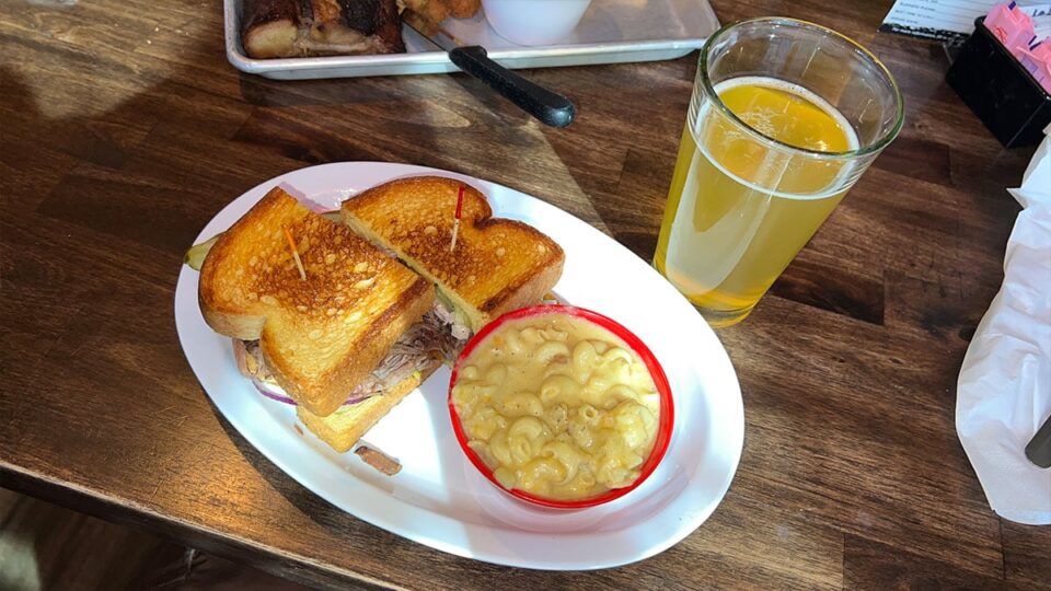 Brisket Sandwich at Fox Smokehouse BBQ with coleslaw and Texas toast.