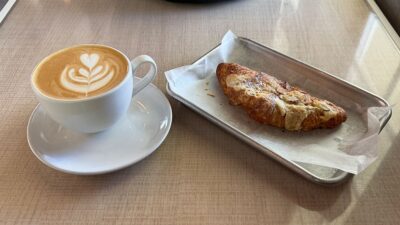 Vanilla Latte and an Almond Croissant from Coffee Religion