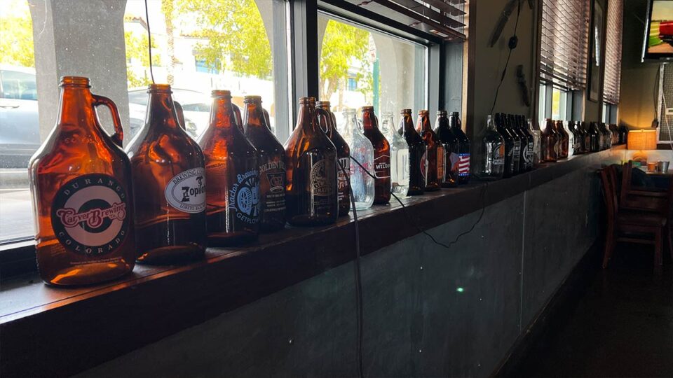 window lined with beer