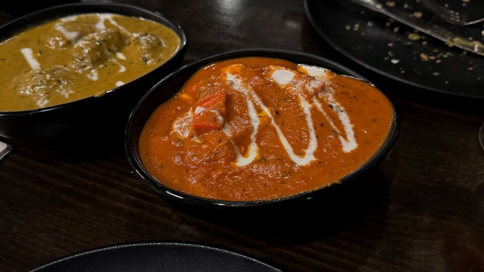 Bowl of chicken tikka masala in creamy tomato sauce at Mint Indian Bistro