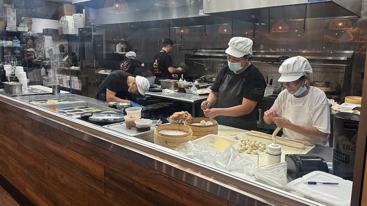 chefs making dumplings in the open kitchen at kung fu dumplings in summerlin las vegas