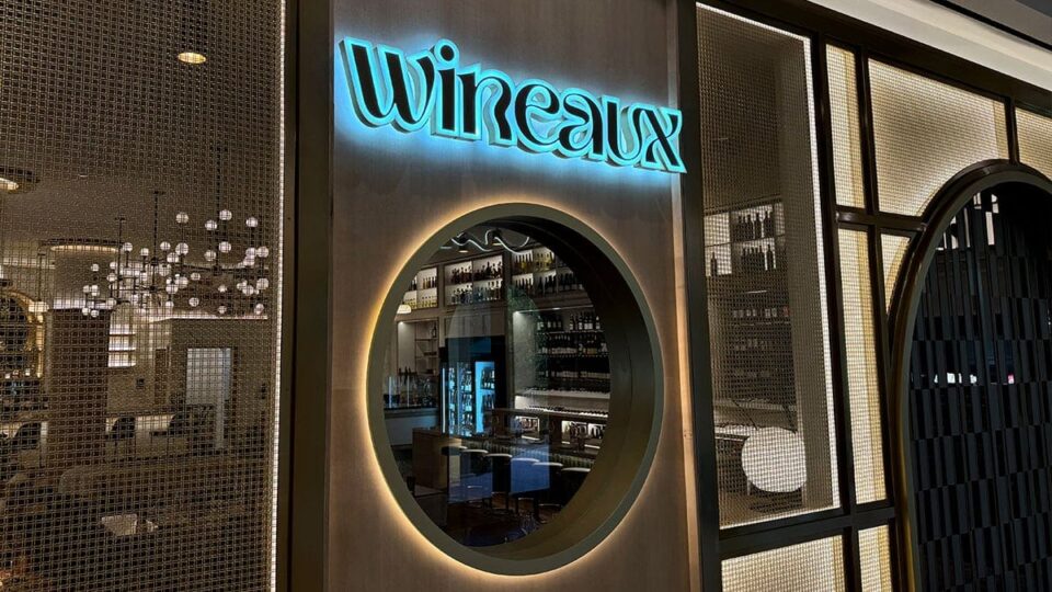 Exterior of Wineaux with a welcoming storefront and modern design, highlighting the restaurant’s entrance and outdoor ambiance.