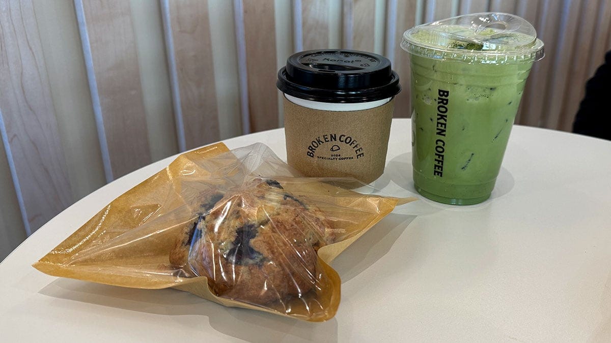 Iced matcha, vanilla latte, and blueberry scone from Broken Coffee.