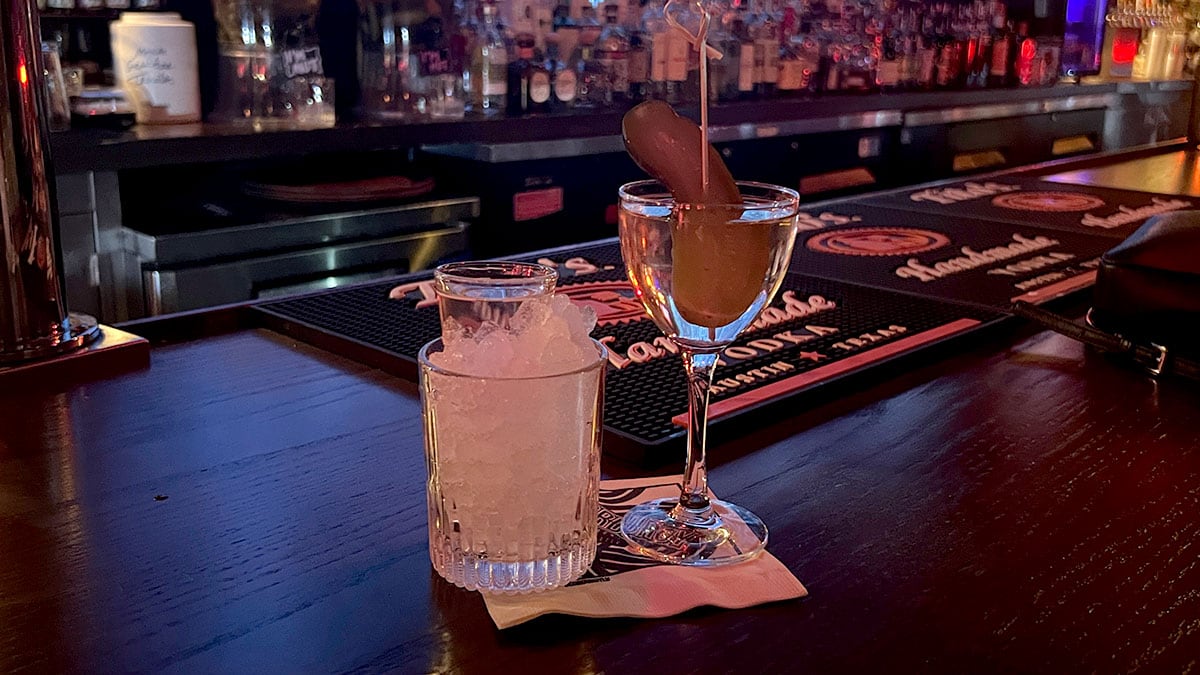 Pickle Tini cocktail made with vodka and pickle juice served at Corduroy bar in downtown Las Vegas.