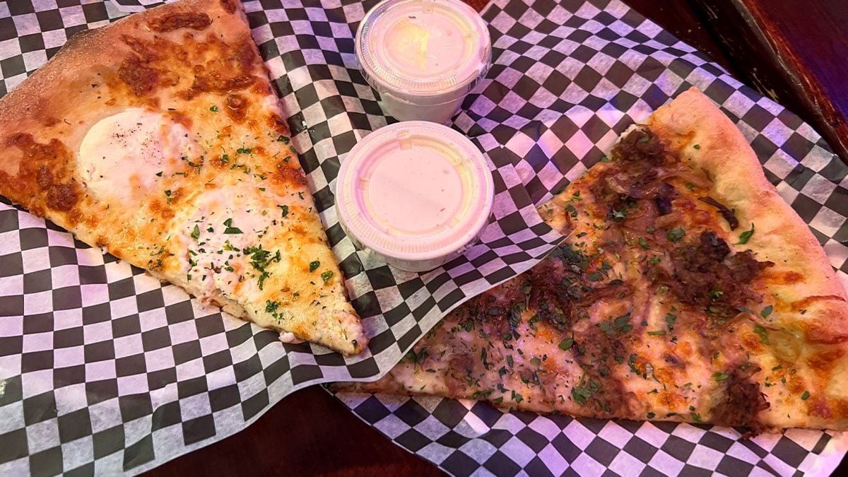 The Barry White and Hog Heaven pizzas on a table at Evel Pie on East Fremont Street in downtown Las Vegas.
