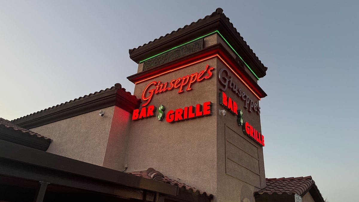 Outside view of Giuseppe’s Bar & Grille on South Durango in Southwest Las Vegas, a 24-hour Italian sports bar and local staple.