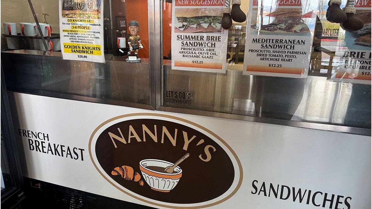 Interior counter at Nanny’s Cafe in Las Vegas featuring the ordering area and café display.