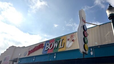 Exterior of Boulder Bowl showing the outside entrance of the historic bowling alley.