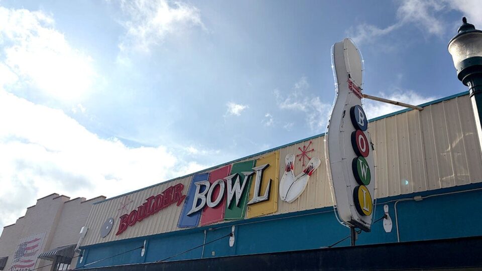 Exterior of Boulder Bowl showing the outside entrance of the historic bowling alley.