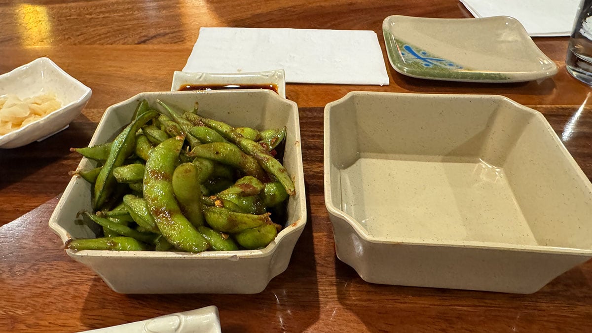 Spicy garlic edamame appetizer seasoned with garlic and spice at Sushi Fever