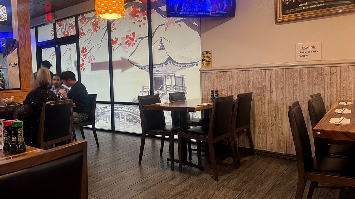 Interior view of Sushi Fever restaurant in Las Vegas with seating and sushi bar.