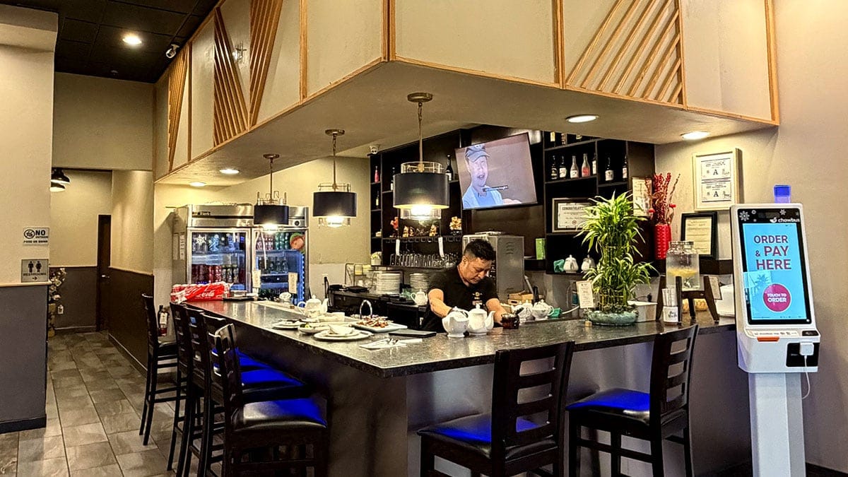 he bar at China Mama serving food and drinks in a modern, inviting atmosphere.