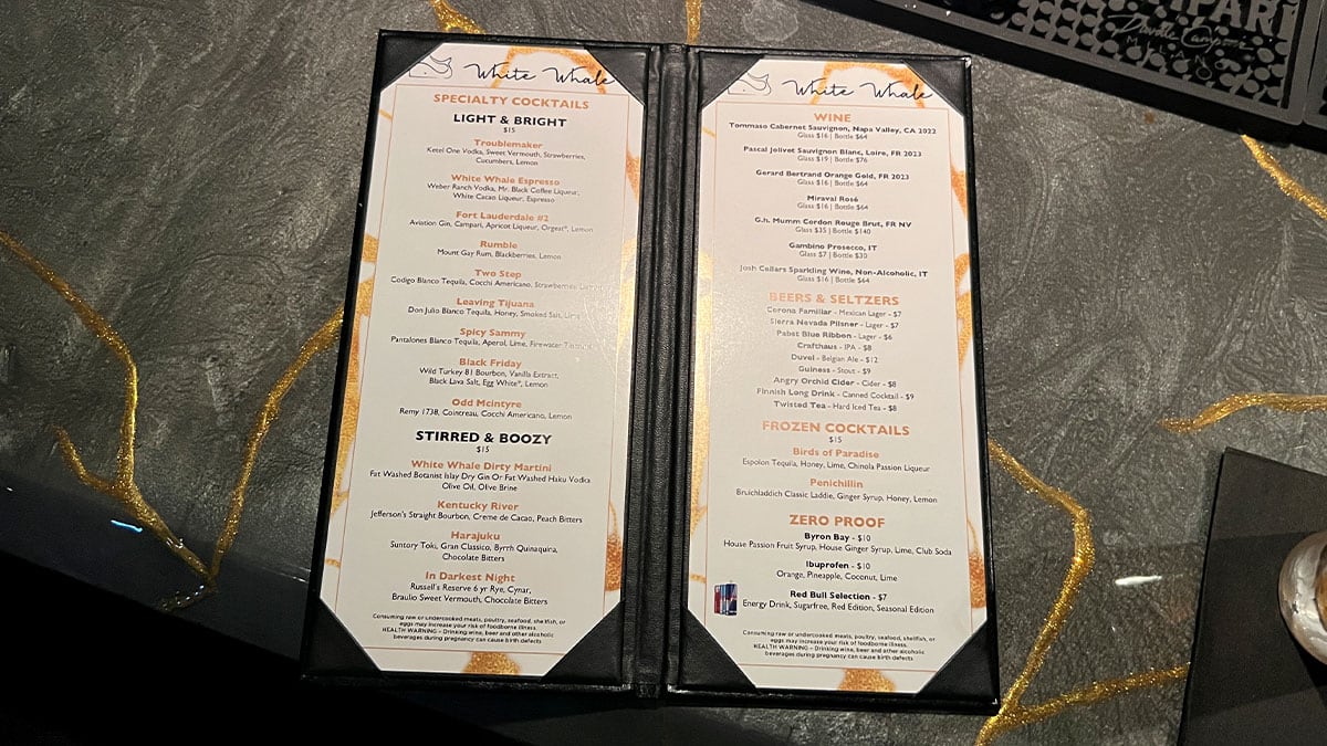 White Whale drink menu showcasing cocktails and beverage options.