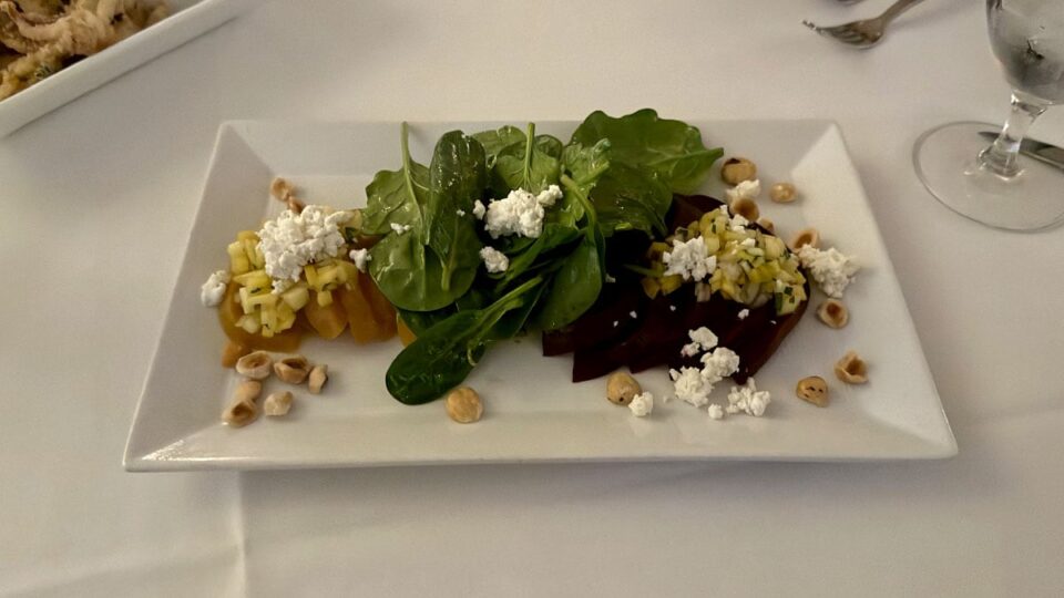 Beet salad with baby spinach, lavender goat cheese, mango, hazelnuts, and mustard vinaigrette at Vintner Grill in Summerlin.