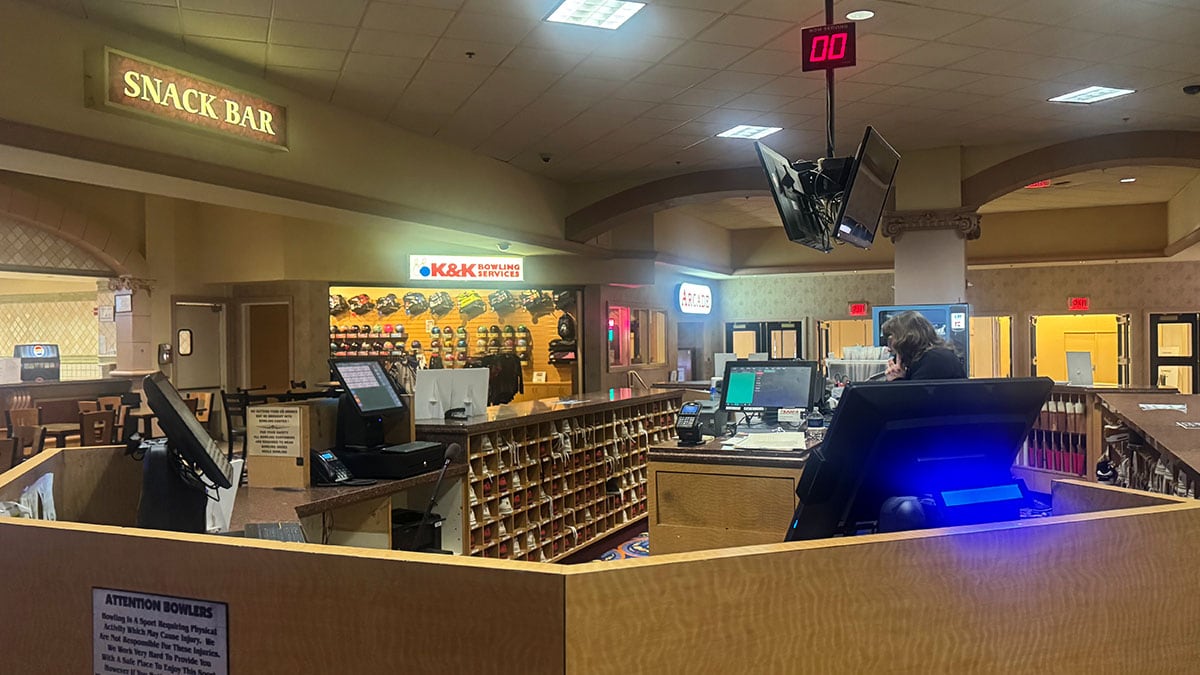 Front counter area inside Suncoast Lanes at Suncoast Casino for check-in and shoe rentals.