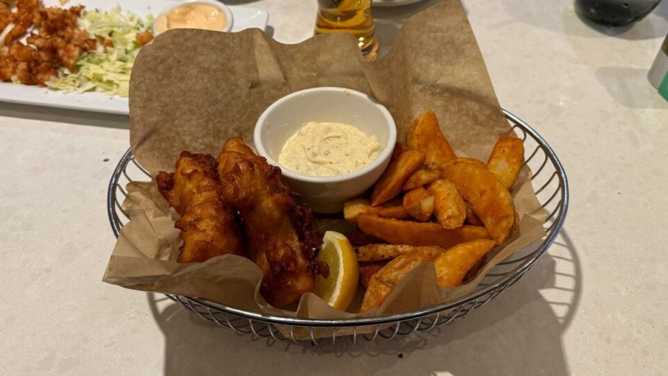 Tempura battered cod with seasoned fries and signature slaw at Briggs Oyster Co.