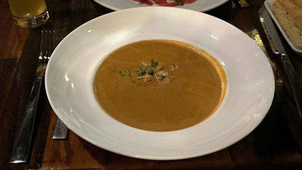 Creamy lobster bisque served during Valentine’s dinner at Aromi
