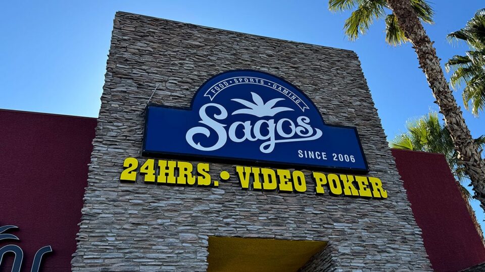 The Sagos Tavern sign is easy to spot on Fort Apache, calling you in for cold beer and a quick bite.