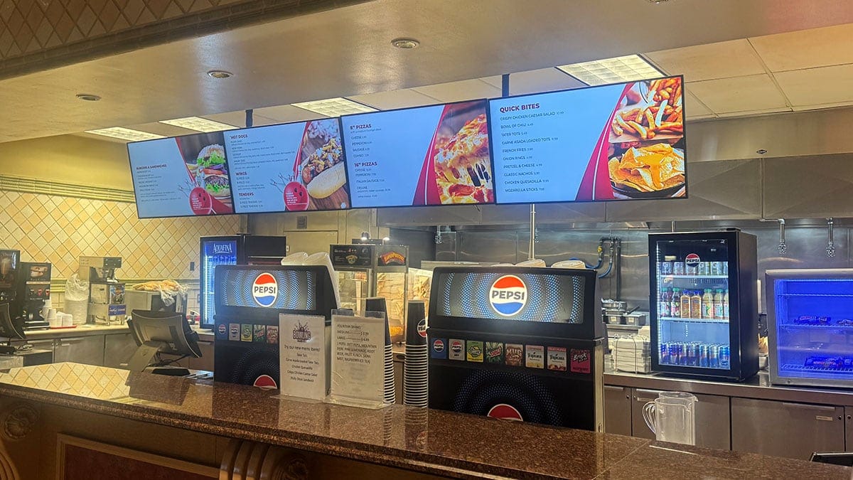 Snack bar area inside Suncoast Lanes at Suncoast Casino offering food and drinks for bowlers.
