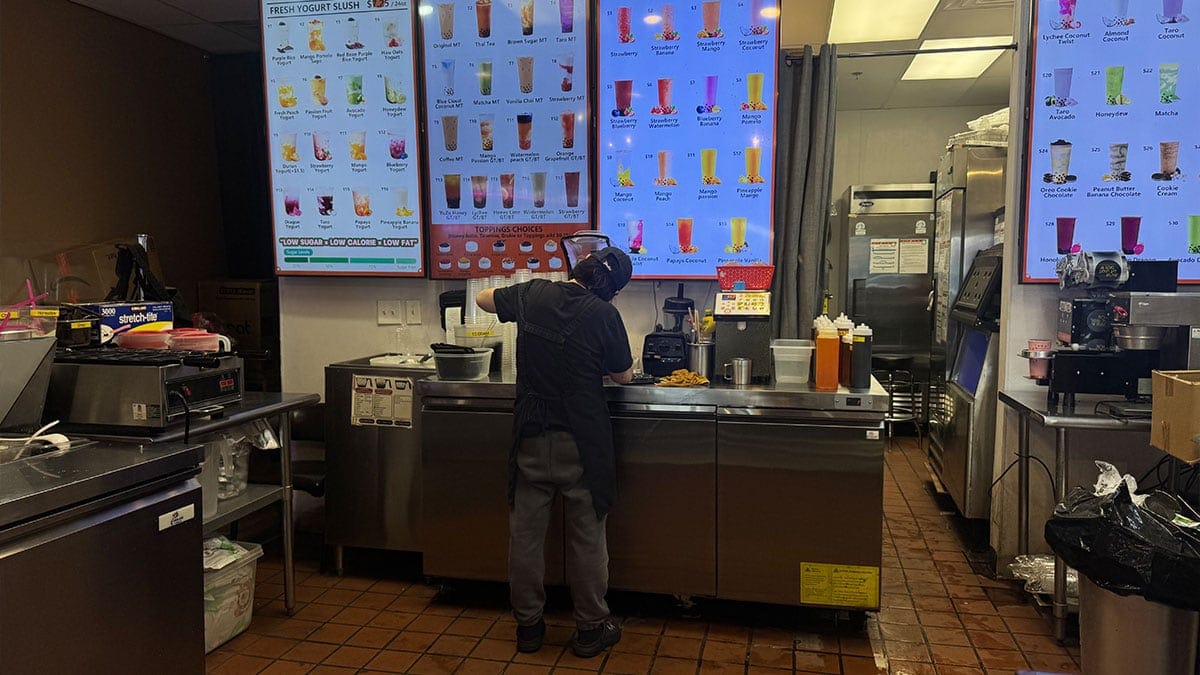 Staff members making boba drinks at Domie’s Boba Tea on Lake Mead in Las Vegas.