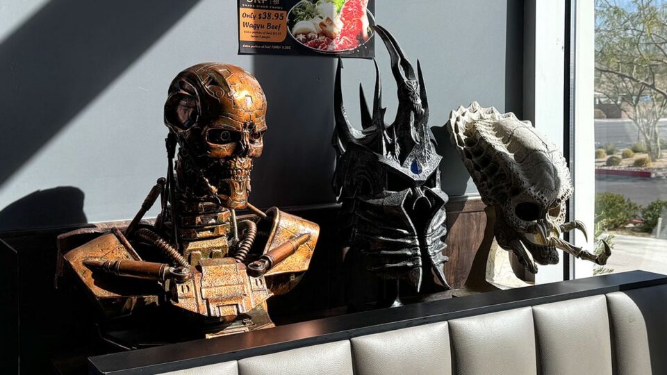 Metal sculptures of Terminator and Alien characters decorating Tachi Ramen interior
