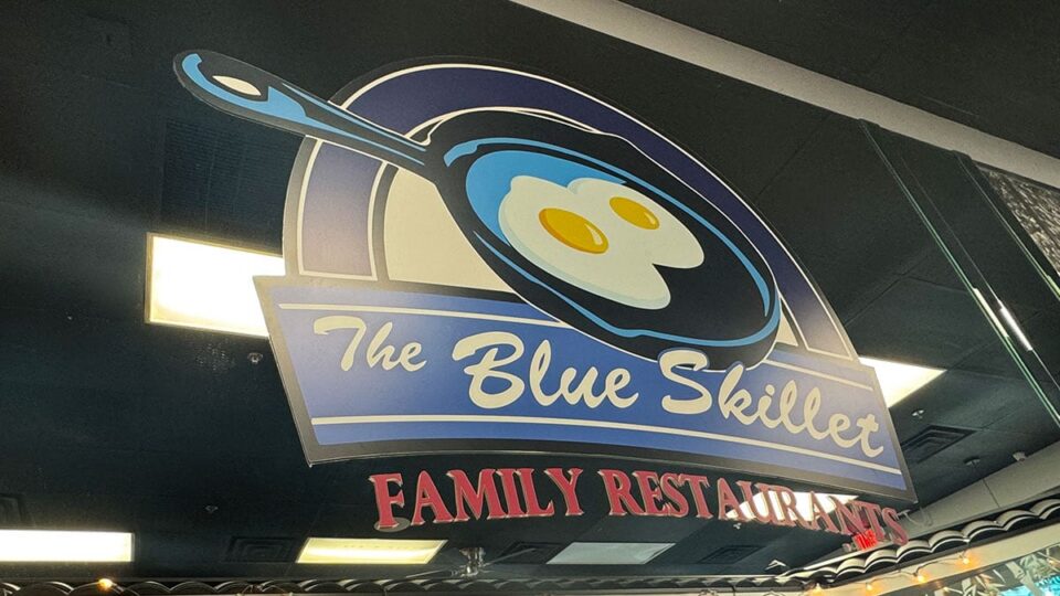 The Blue Skillet Family Restaurant logo on the wall inside the Las Vegas diner.