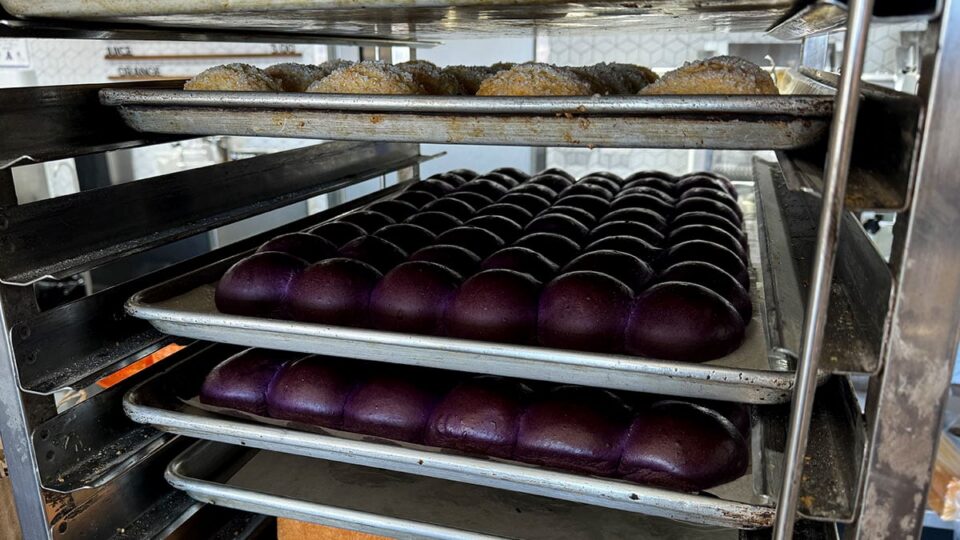 Ube rolls from Milk Bread LV arranged for display.