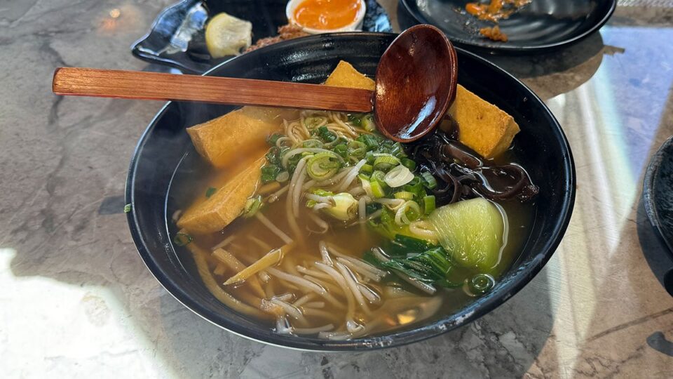 Vegetarian ramen with tofu, mushrooms, carrots, and roasted vegetables at Tachi Ramen
