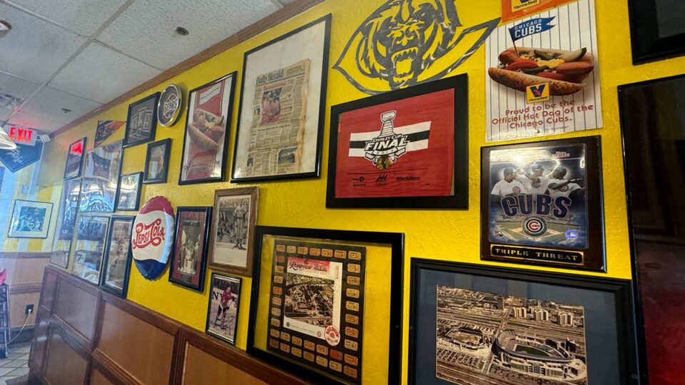 Vintage and current Chicago sports team memorabilia displayed inside Windy City Beefs-N-Dogs.