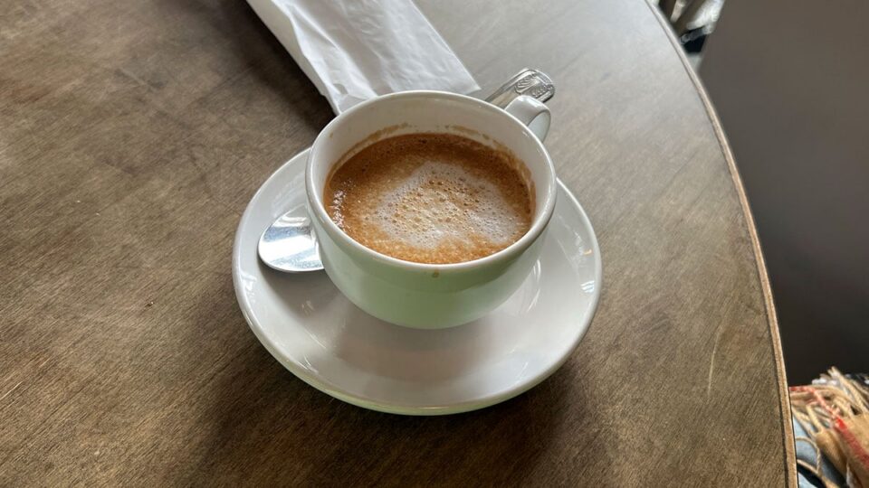 Warm latte with espresso foam served at Le Café Central in Chinatown Las Vegas.