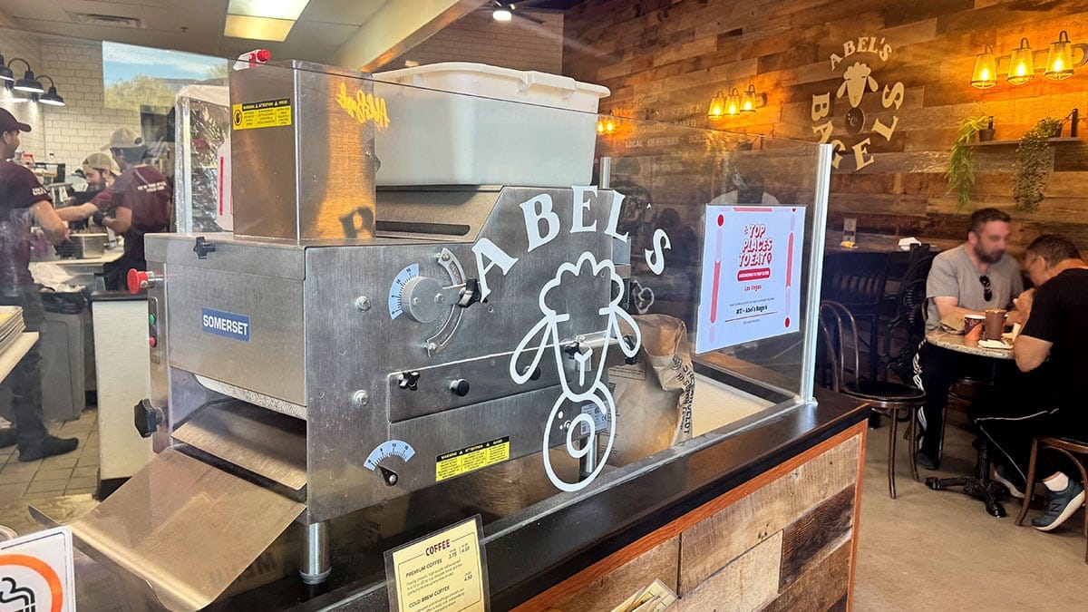 the Abel’s Bagels logo sign displayed inside the shop in Las Vegas