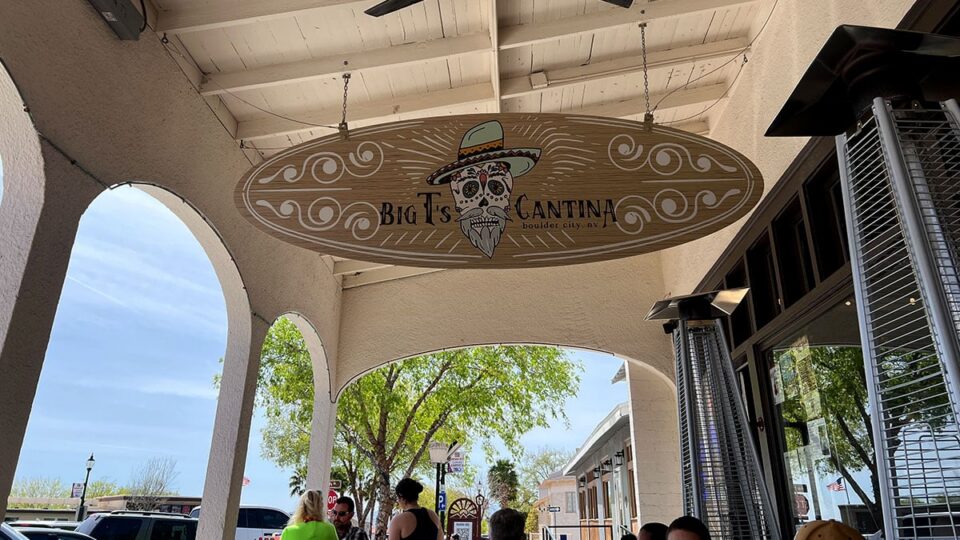 Big T’s Cantina skull logo hanging above the outdoor patio in Boulder City