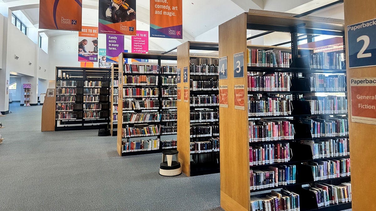 rows of books on shelves inside Sahara West Library in Summerlin with a wide variety of titles