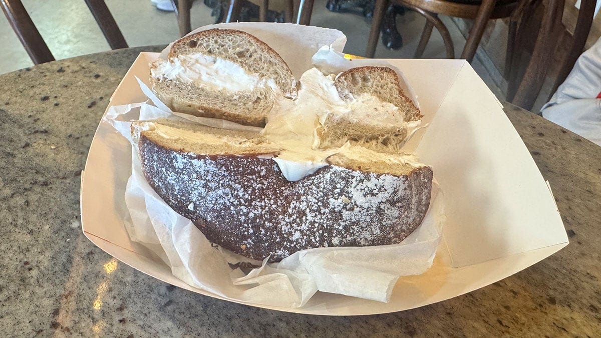 a freshly made French toast bagel with cream cheese from Abel’s Bagels