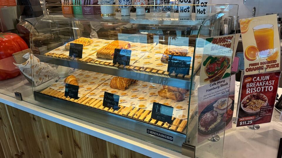 Fresh pastries displayed near the front window at Cafe Mong.