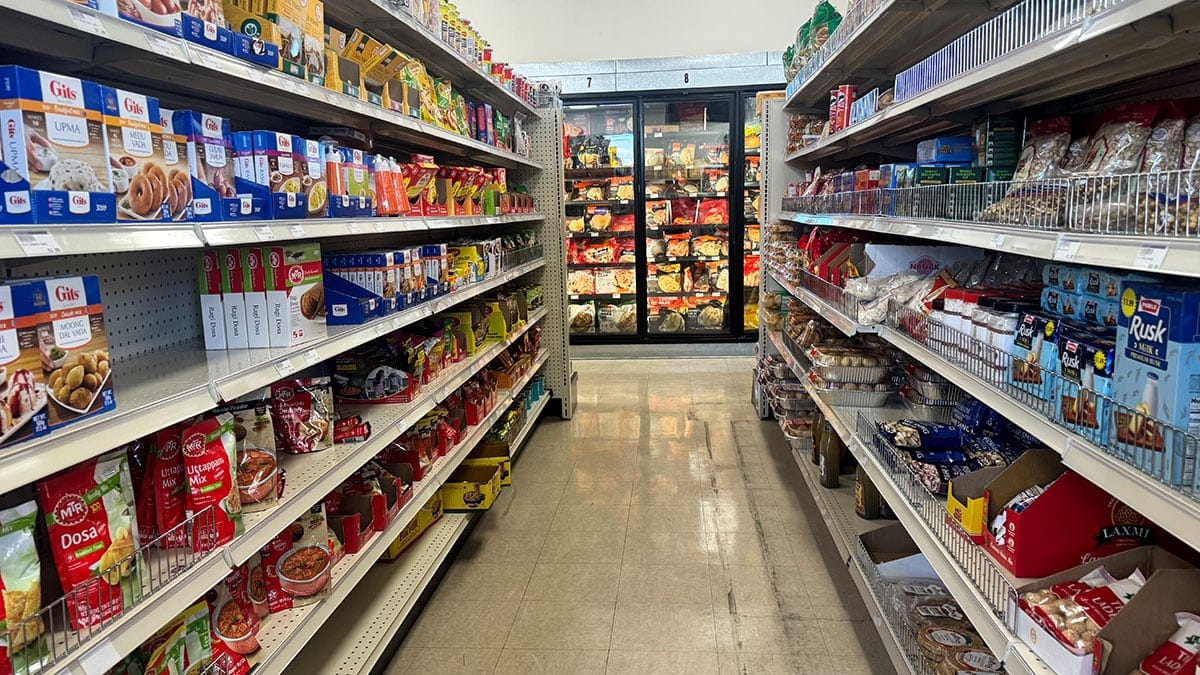 inside view of India Mart showing aisles and products
