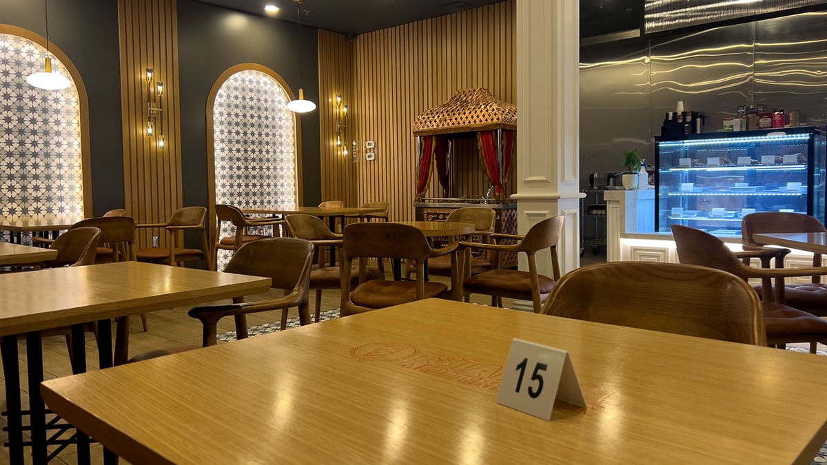 interior view of istanbul mediterranean 2 showing dining tables booths and warm modern decor inside the restaurant