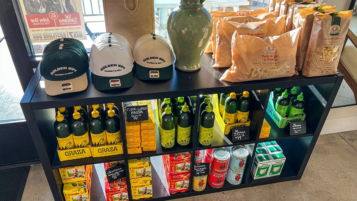 Merch-and-to-go-sauces-Golden-Boy-Market-Deli