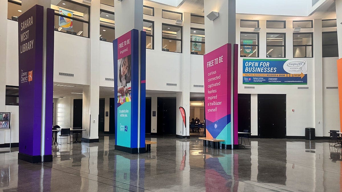 a wide interior view inside Sahara West Library in Summerlin with open space seating and modern design